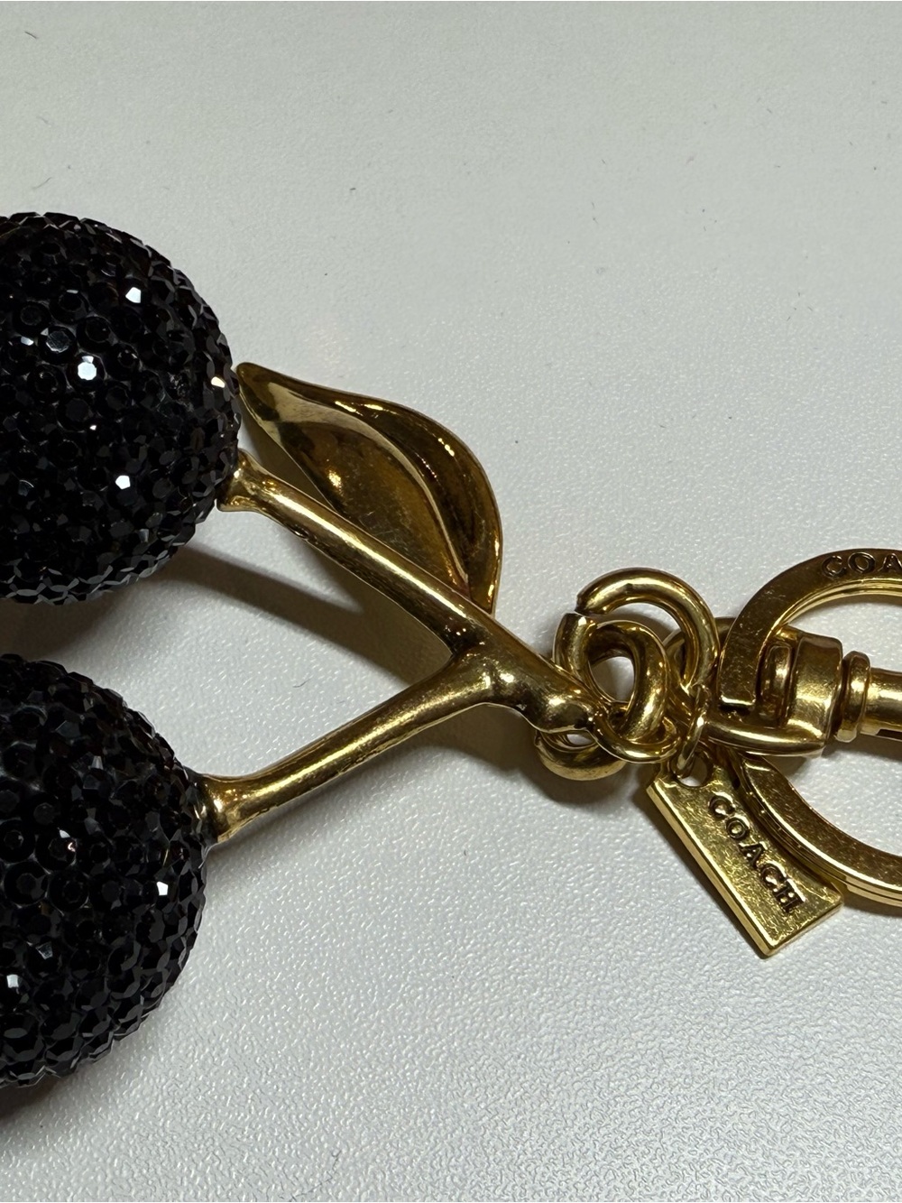 Coach Gold-Tone Black Crystal Cherry Brooch Charm